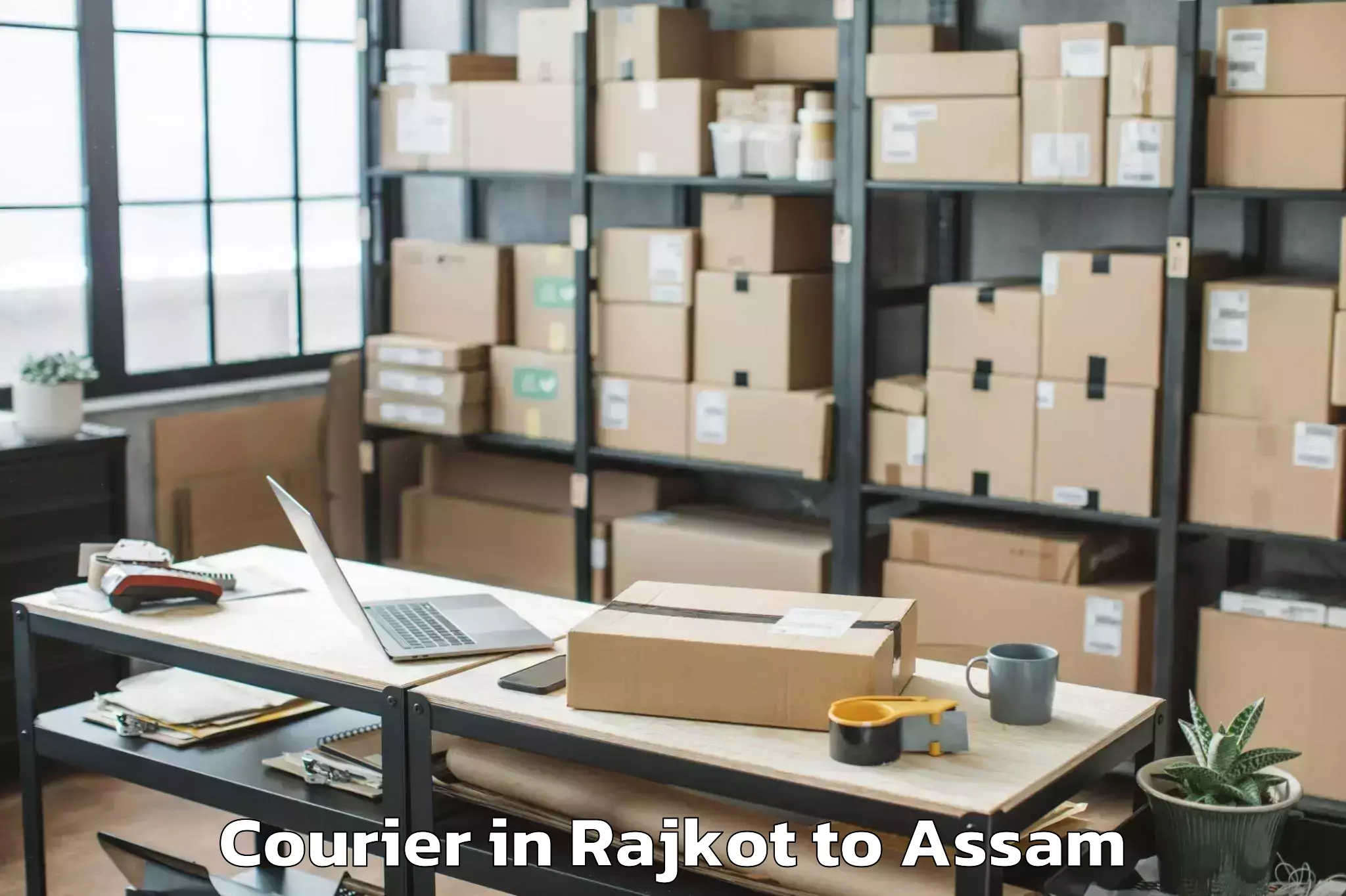 Reliable Rajkot to Basugaon Courier